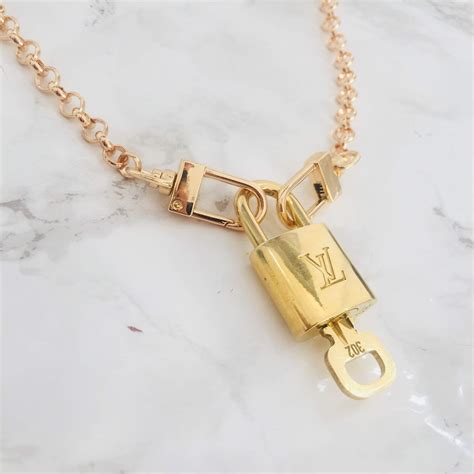 vintage lv lock|Lv lock necklace.